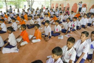 Children engrossed in meditation.