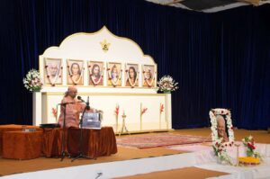 Swami Lalitananda conducts the service in Noida.