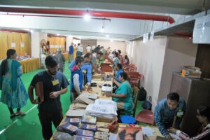 The book stall is busy throughout the event.