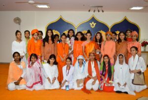 Girls enact as various saints of India.