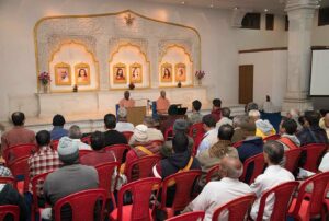 Swamijis address the devotees during Centre Department meeting.