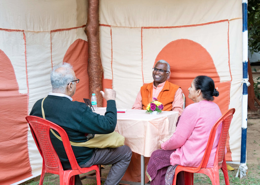 A YSS sannyasi providing Spiritual counsel to devotees