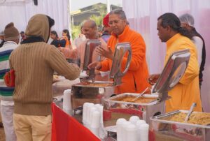 Monks serve prasad after diksha ceremony, Indore.