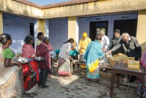 Celebrations at Ranchi start with feeding at leprosy colony.
