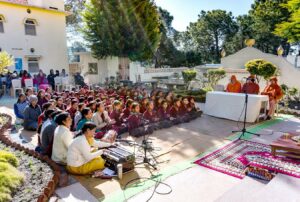 Students, teachers, and devotees join in chanting, Dwarahat.