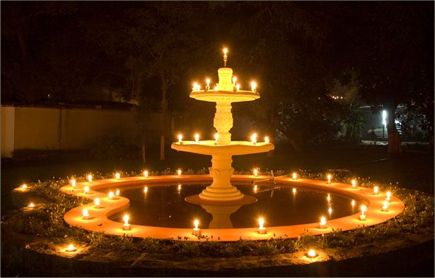 Fountain lighted with lamps.