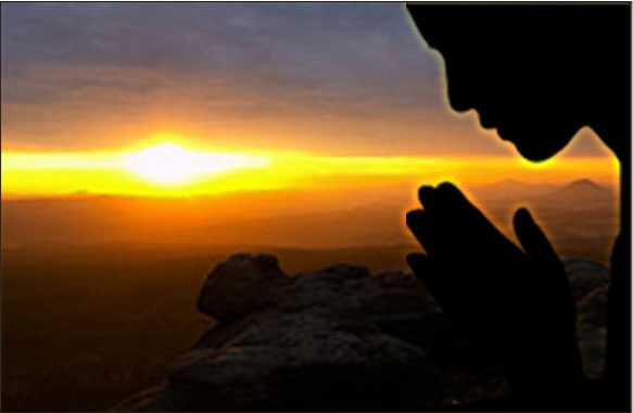 Praying during sunset.
