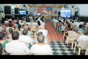 Swami Pavitrananda gives a brief introduction of YSS at a public event in Vellore.