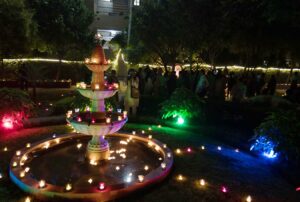 Specially lit ashram grounds and…